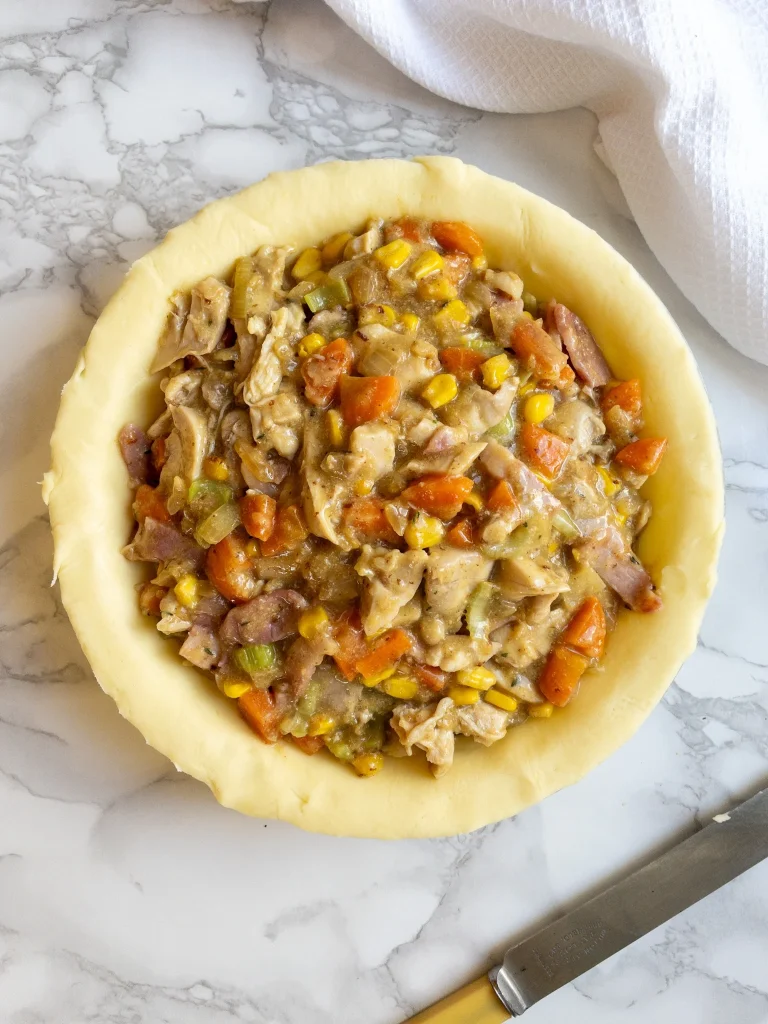 Place the pot pie filling in the pastry case