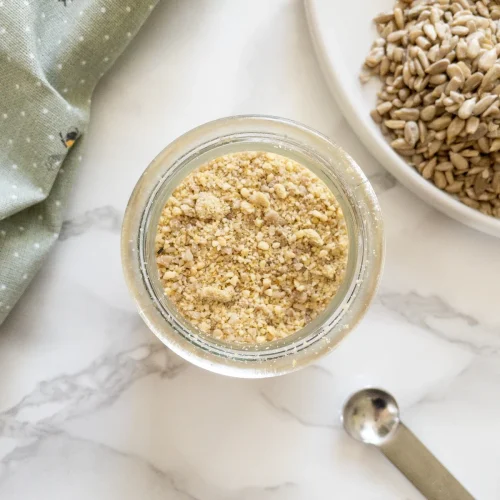 Dairy Free Parmesan made with cashews, sunflower seeds and nutritional yeast.