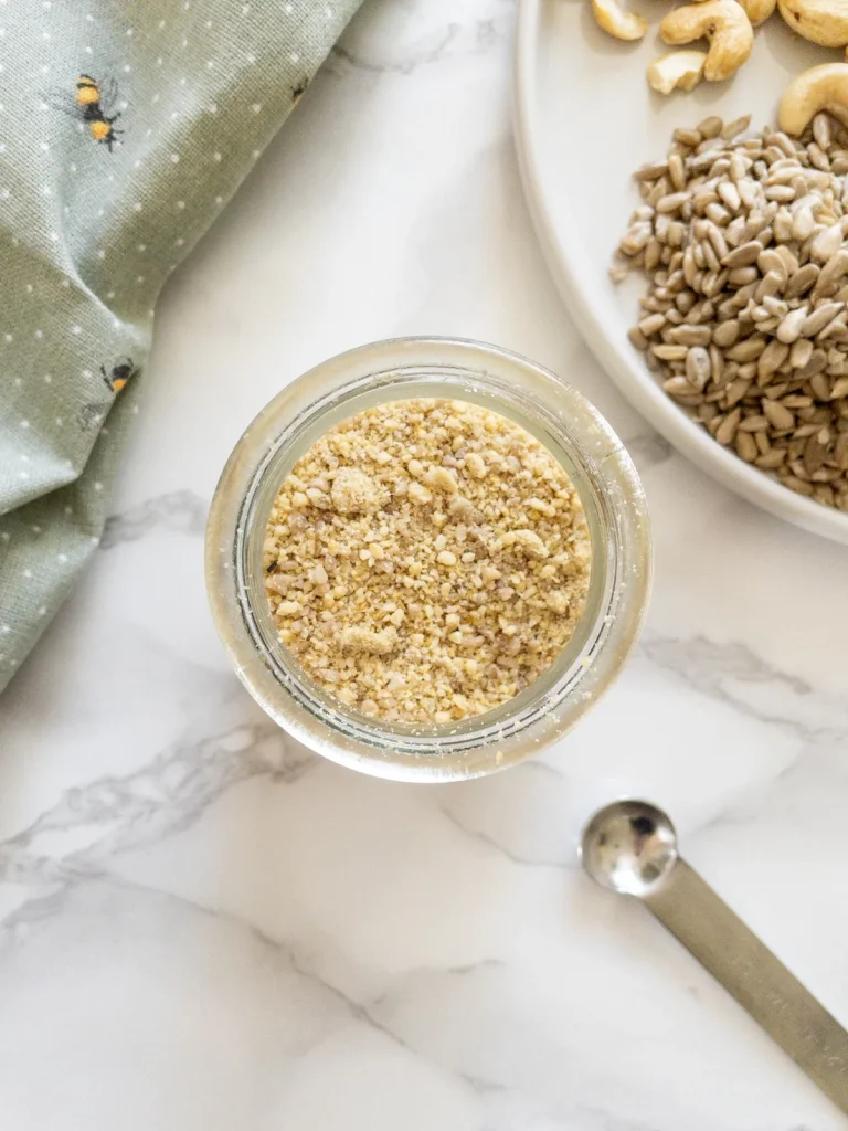 Dairy Free Parmesan made with cashews, sunflower seeds and nutritional yeast.