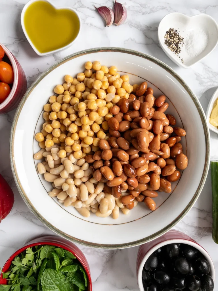 Chickpeas, borlotti beans and cannellini beans for vegan bean salad.