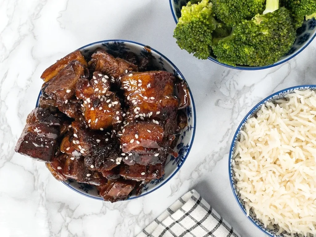 Sticky Pork Belly Served with Steamed Rice and broccoli