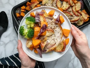 Honey mustard pork chops served with roasted sweet potatoes and apples.