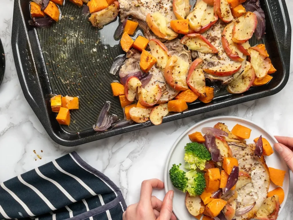 Pork chops with honey mustard sauce and baked apples.