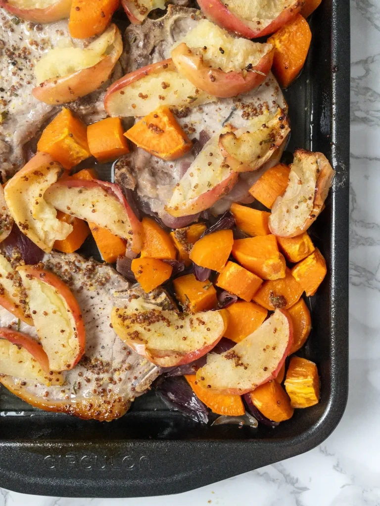 heet pan pork chops with sweet potatoes and apples.