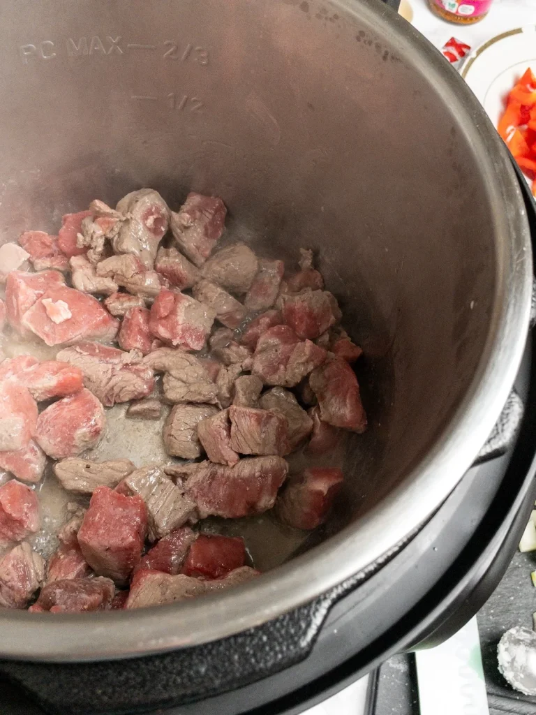 Sautéing beef in the Instant Pot for curry.