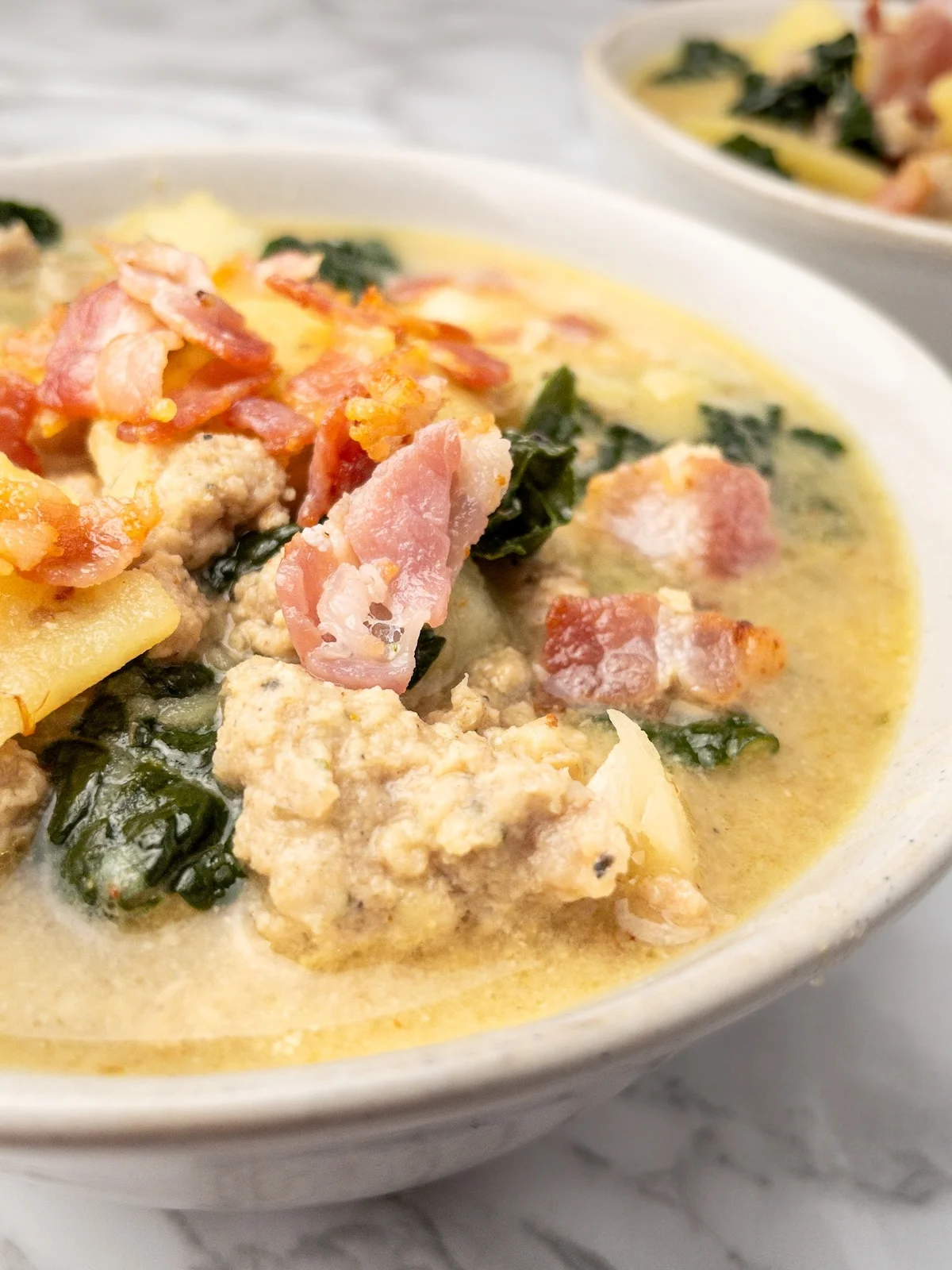 Close-up of dairy free Zuppa Toscana soup.