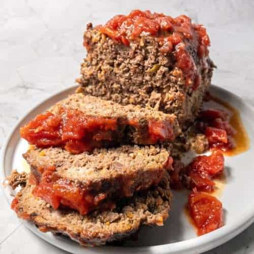 Easy meatloaf recipe without milk with a tomato sauce glaze.