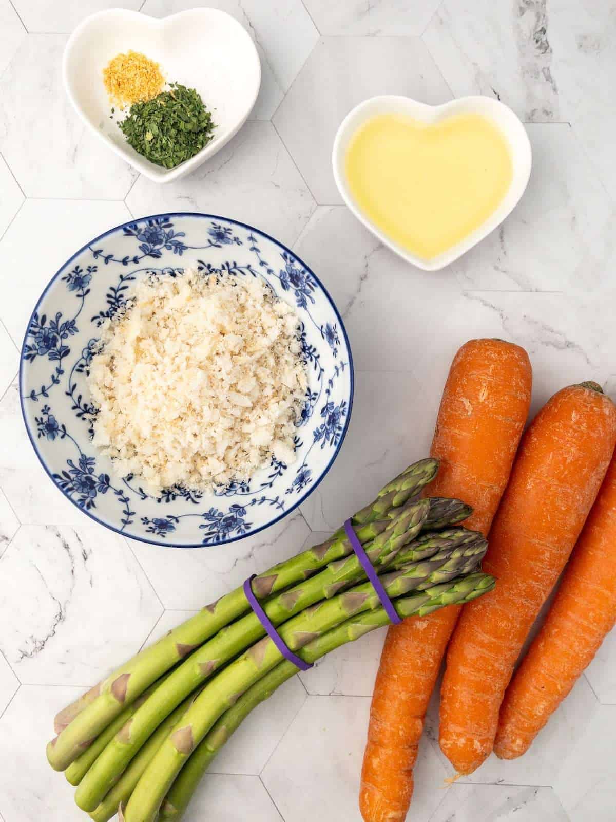 Ingredients for roasted carrot and asparagus with breadcrumb topping.