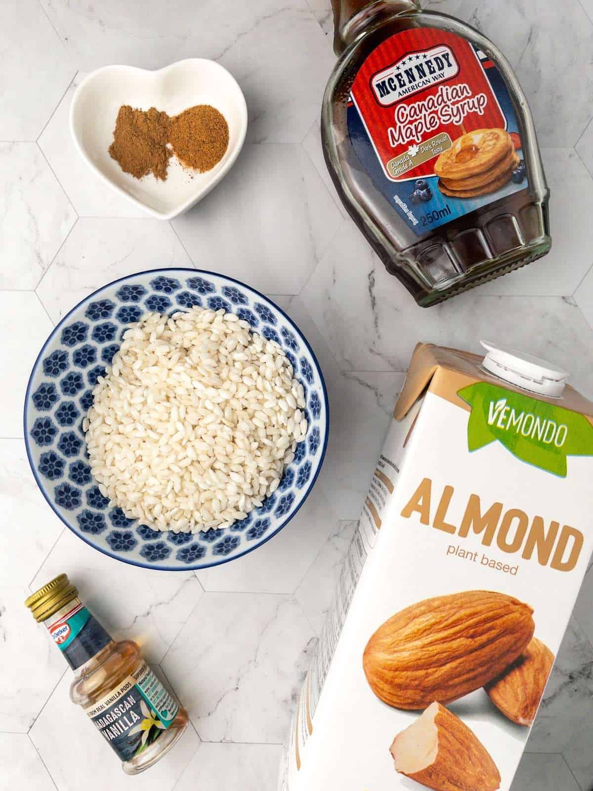 Ingredients for dairy-free rice pudding on a countertop.